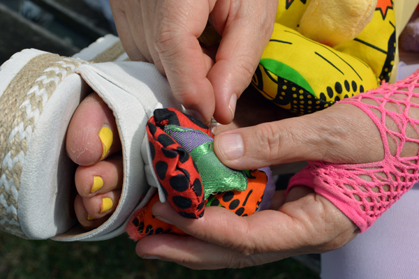 Cally Trench, Hands of Alexandra Holownia (Alexandra Fly)  with a Mrs Vagina shoe