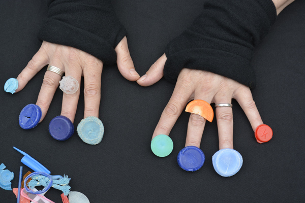 Cally Trench, Hands of Imogen Welch with beach plastic collected by  her at Southend, 16th April 2019