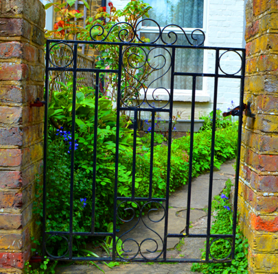 Twenty-five Wrought Iron Front Gates